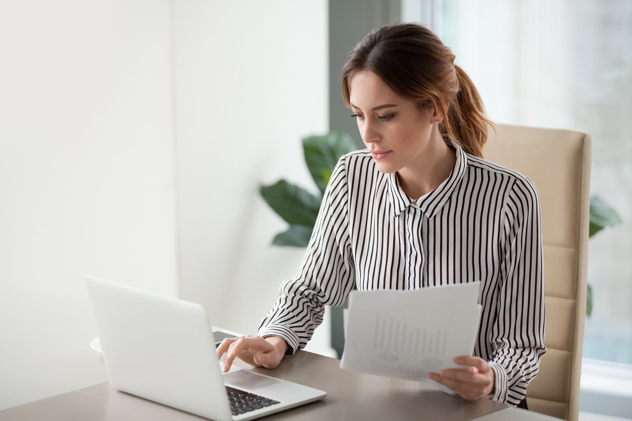 case study of business benefits Business woman working on a laptop