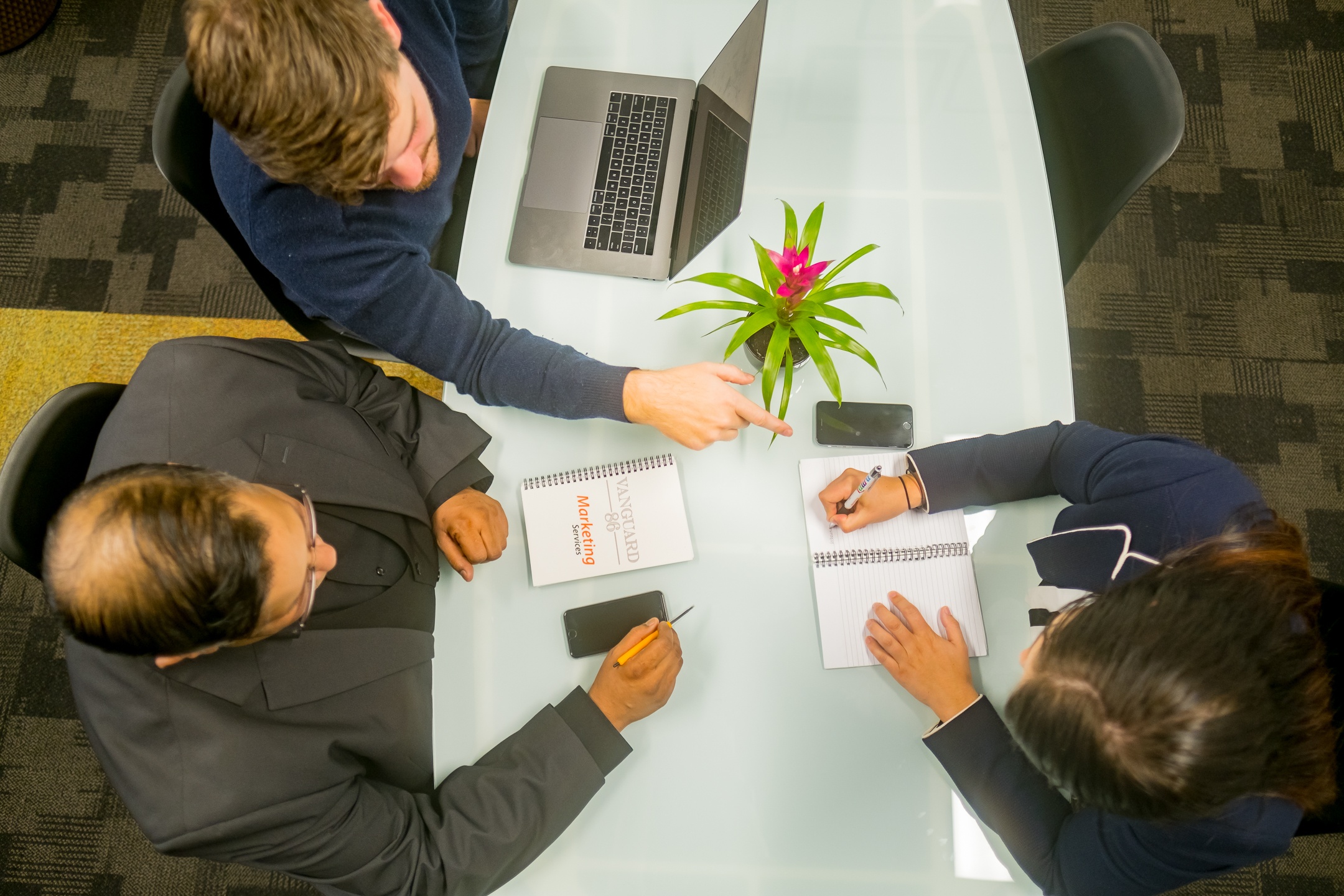 Team_work_collaboration_conference_table_working.jpg